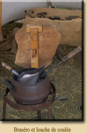 Brasero et louche de coulĂ©e